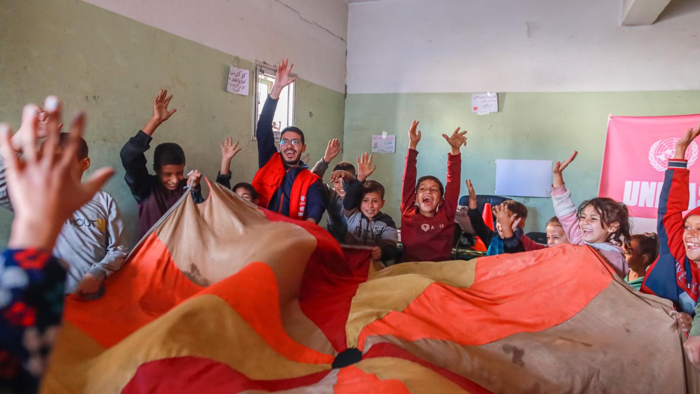 some people are raising their hands up and cheering