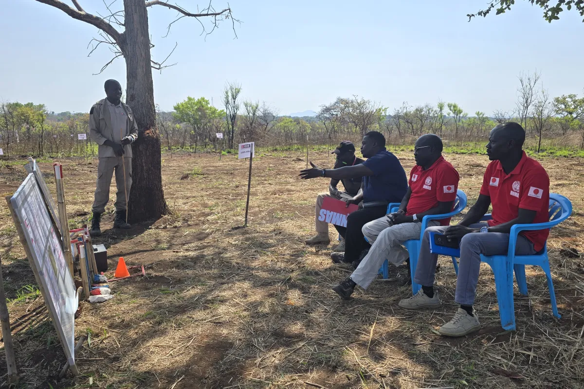 photo_1_unmas_staff_providing_on_the_job_training_to_nmaa_personnel_during_qa_visit.jpg