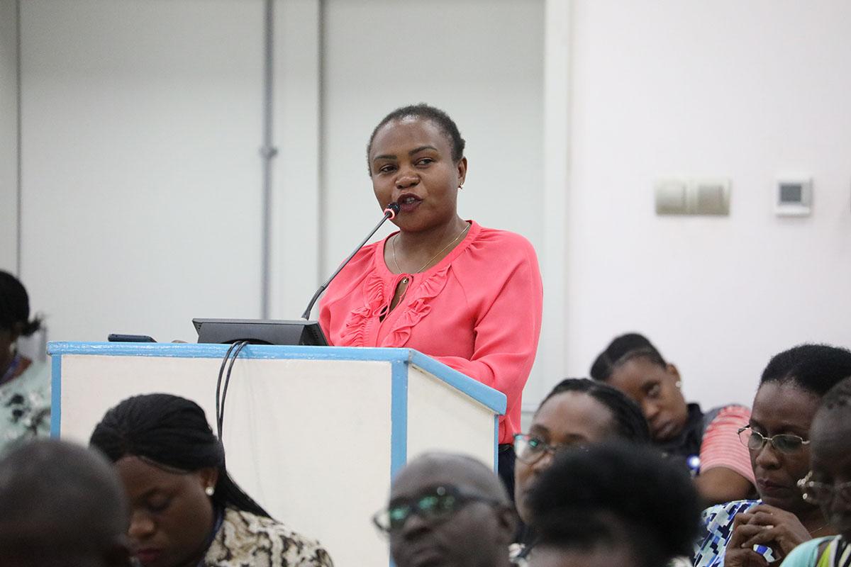 Deputy President NASA, Sharon Twongyeirwe, asks Director RSCE questions at the all-staff townhall