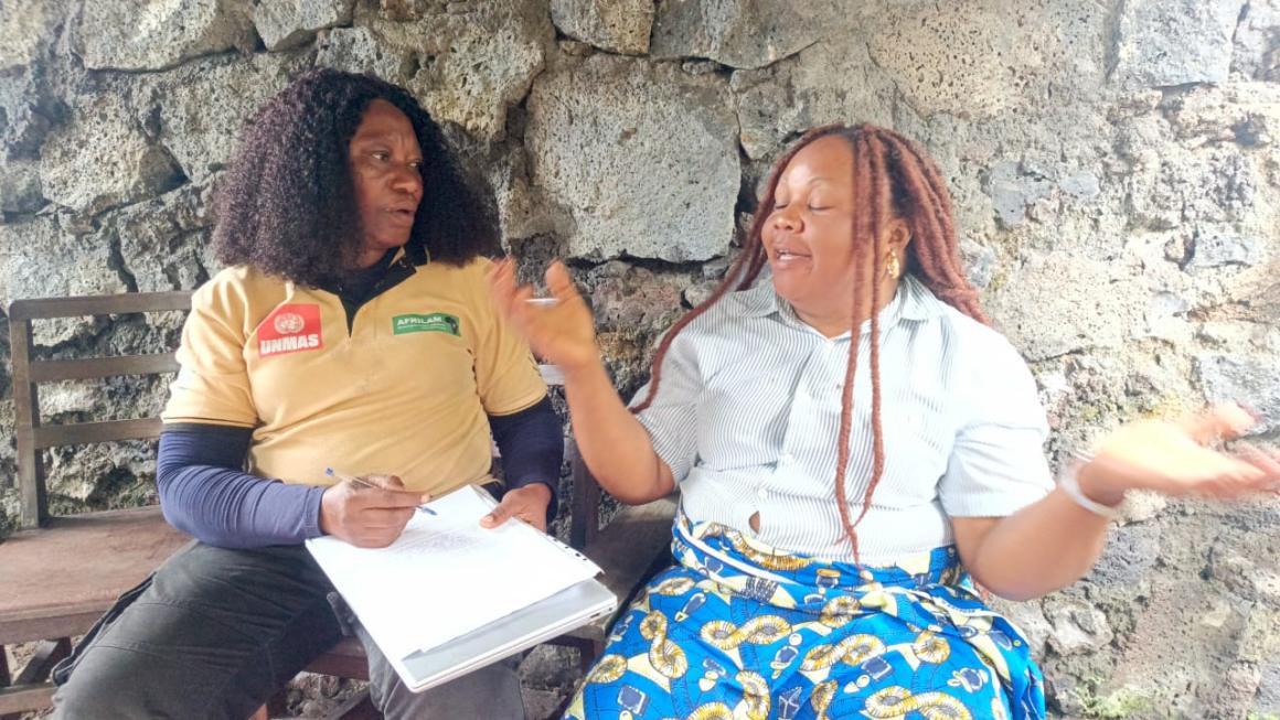 a woman is taking an interview with another woman