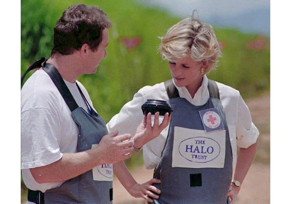 Princess Diana with Paul Heslop. Mr. Paul Heslop is now Chief of Programmes of the United Nations Mine Action Service, responsible for delivering mine action programs in 19 countries and territories. Photo Credit AFP.