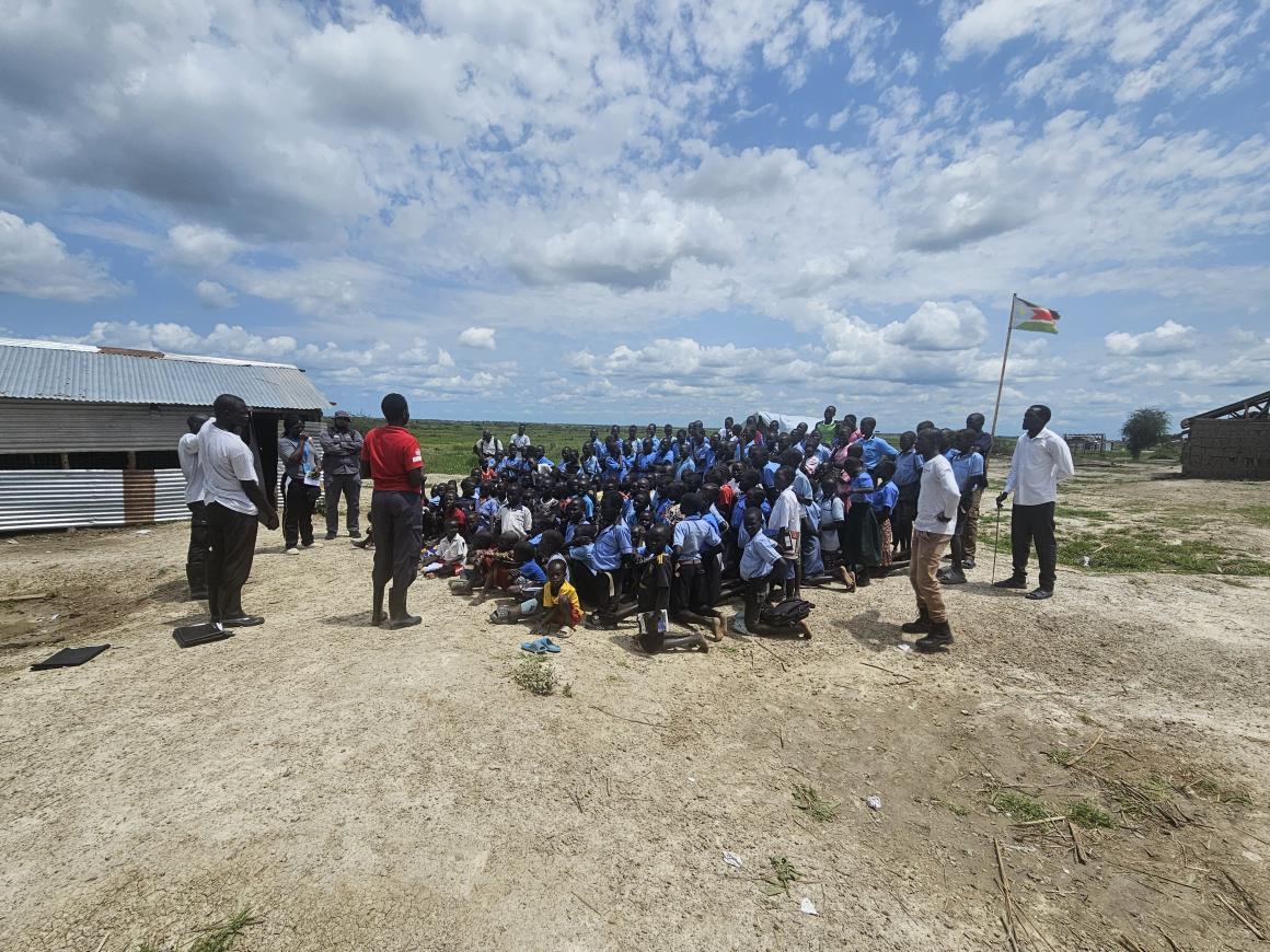 Children participate in an interactive EORE session, learning how to recognise and safely report explosive hazards. Photo credits: Sikulisiwe Gwara /UNMAS South Sudan